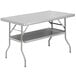 A grey rectangular Regency stainless steel folding table with a shelf.