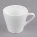 A Libbey white porcelain espresso cup with a handle.