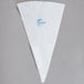 A white triangular Ateco pastry bag with blue writing.