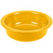 A close up of a yellow Fiesta serving bowl.