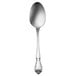 An Oneida Arbor Rose stainless steel tablespoon with a handle.