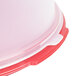 A white Rubbermaid plastic cake storage container with a lid.
