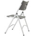 A gray National Public Seating folding chair with a gray plastic seat and back.