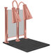 A Hanson Heat Lamps bright copper carving station with black posts.
