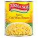A #10 can of Furmano's fancy cut wax beans on a table.