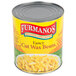 A #10 can of Furmano's Fancy Cut Wax Beans on a table.