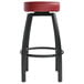 A Lancaster Table & Seating black swivel backless bar stool with a maroon seat.