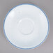 A white porcelain 10 Strawberry Street Arctic Blue saucer with a blue speckled design.