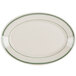 A white oval china platter with green stripes on the edge.