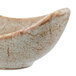 A 10 Strawberry Street Tiger Eye porcelain canoe tid bit bowl with a brown and white design.