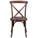 A Flash Furniture mahogany wooden chair with a cross back.