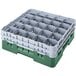 A white plastic Cambro glass rack with green extenders and 25 compartments.