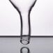 A Franmara glass decanter funnel with a clear glass tube and a white rim.