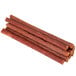 A pile of Weaver's Hot Beef Sticks on a white background.