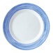 An Arcoroc blue and white striped dessert plate.