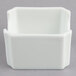 A white square Libbey Reflections porcelain sugar caddy with a curved edge and lid.