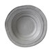 A close-up of a grey Elite Global Solutions Della Terra melamine bowl with a spiral design in granite stone.