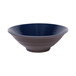An Elite Global Solutions Durango melamine bowl with a white background and a dark blue rim.