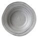 A close-up of a grey Elite Global Solutions Della Terra melamine bowl with a granite stone design.