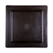 A black square melamine serving board with a circle in the middle.