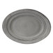A gray Elite Global Solutions irregular oval serving dish with a circular spiral pattern.