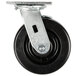 A black swivel plate caster with a metal wheel and black rubber wheel.