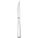 A close-up of a Oneida Stiletto stainless steel steak knife with a silver handle.
