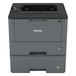 A Brother HL-L5200DWT laser printer with a white background and open lid.