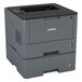 A Brother HL-L5200DWT laser printer with an open lid.