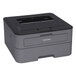A Brother HL-L2300D monochrome laser printer with a lid open on a white background.