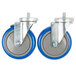 A pair of blue and silver 5" enclosed base swivel stem casters.