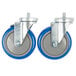 A pair of blue and silver Advance Tabco casters with wheels.