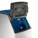 A silver Manitowoc D320 ice storage bin with a blue lid.