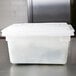 A white Rubbermaid food storage box with lid.
