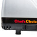 A white Edgecraft Chef's Choice electric knife sharpener with the words "Chef's Choice" on the side.