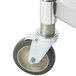 A metal caster wheel for an APW Wyott cookline equipment stand.