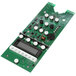 A green circuit board with white circles and black buttons.
