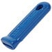 A blue silicone handle sleeve with a rectangular hole.