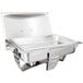 A Vollrath rectangular stainless steel chafer with a lid on it.