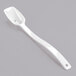 A white plastic Cambro salad bar spoon with a handle and perforated bowl.