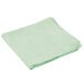 A green Rubbermaid microfiber cloth on a white background.
