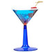 A Fineline Flairware plastic martini glass with a cobalt blue base filled with a blue drink and a cherry.