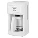 A white STAY by Cuisinart coffee maker with a glass pot and silver accents.
