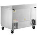 A Beverage-Air stainless steel worktop freezer with wheels and two doors.