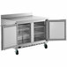 A stainless steel Beverage-Air worktop freezer with two doors open.