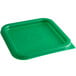 A green square plastic lid on a Cambro CamSquares food storage container.