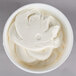 A white bowl filled with Henry & Henry Angel White Buttercreme.