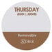 A round white and brown circular Noble Products label with the word "Thursday" in white.