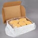 A white box of Golden Breaded Veal Patties in plastic wrap.
