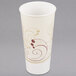 A Solo white wax treated paper cold cup with a swirl design on it.